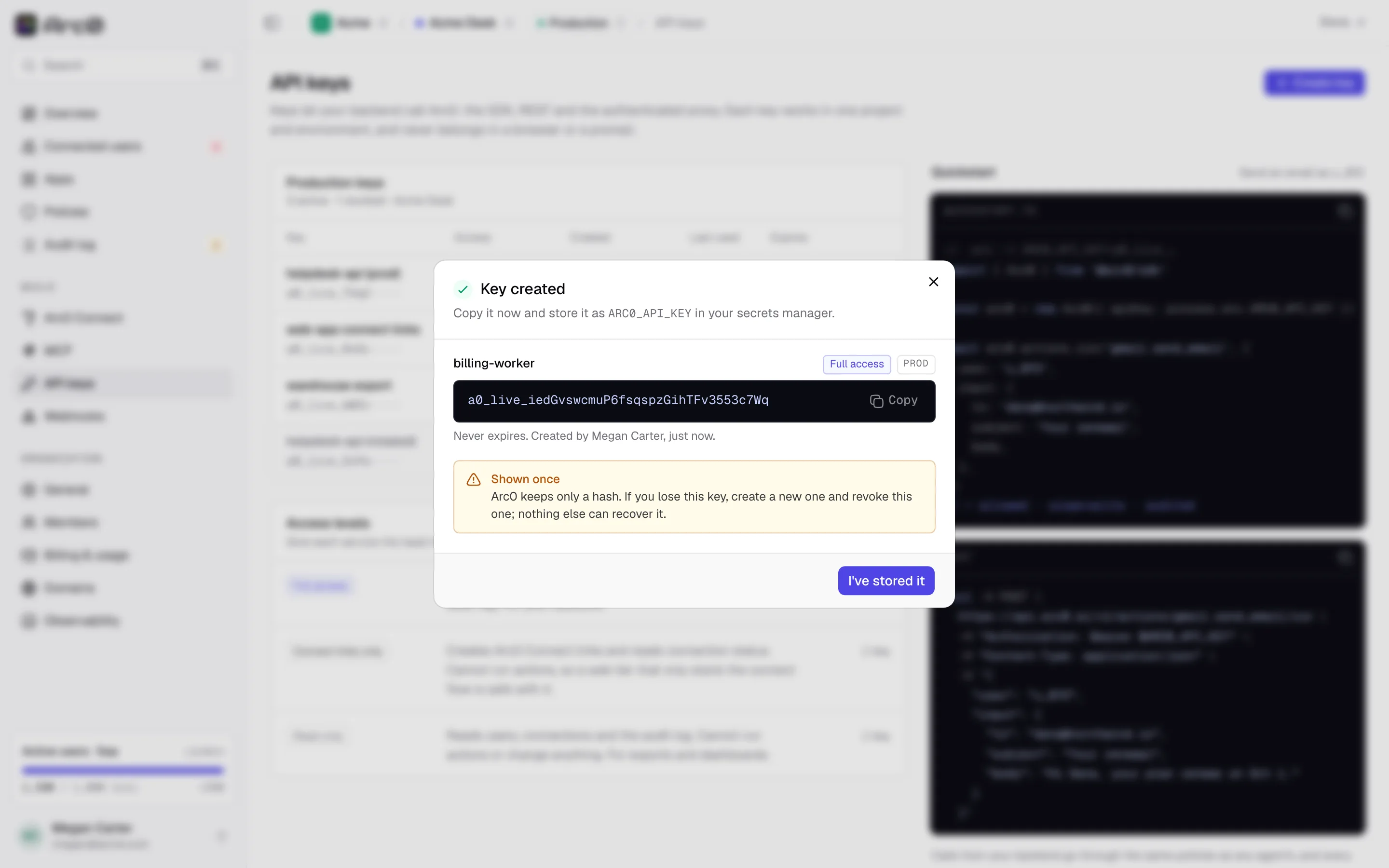 The key-created screen showing the full secret once, with a copy button